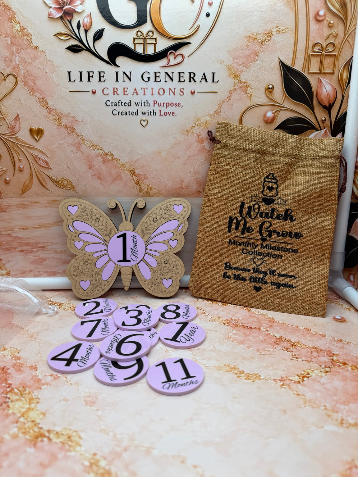 Handcrafted Watch Me Grow butterfly milestone plaque with interchangeable month pieces and storage pouch